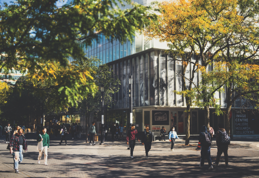 Students walking outside on the campus of Toronto Metropolitan University, located in Toronto, Ontario, Canada.